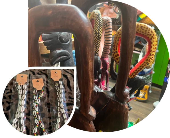 Seashell necklaces displayed on wood stand.