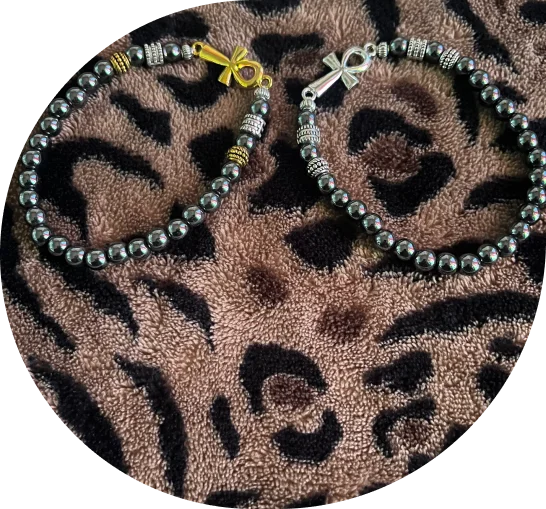 Ankh beaded bracelet on leopard print.